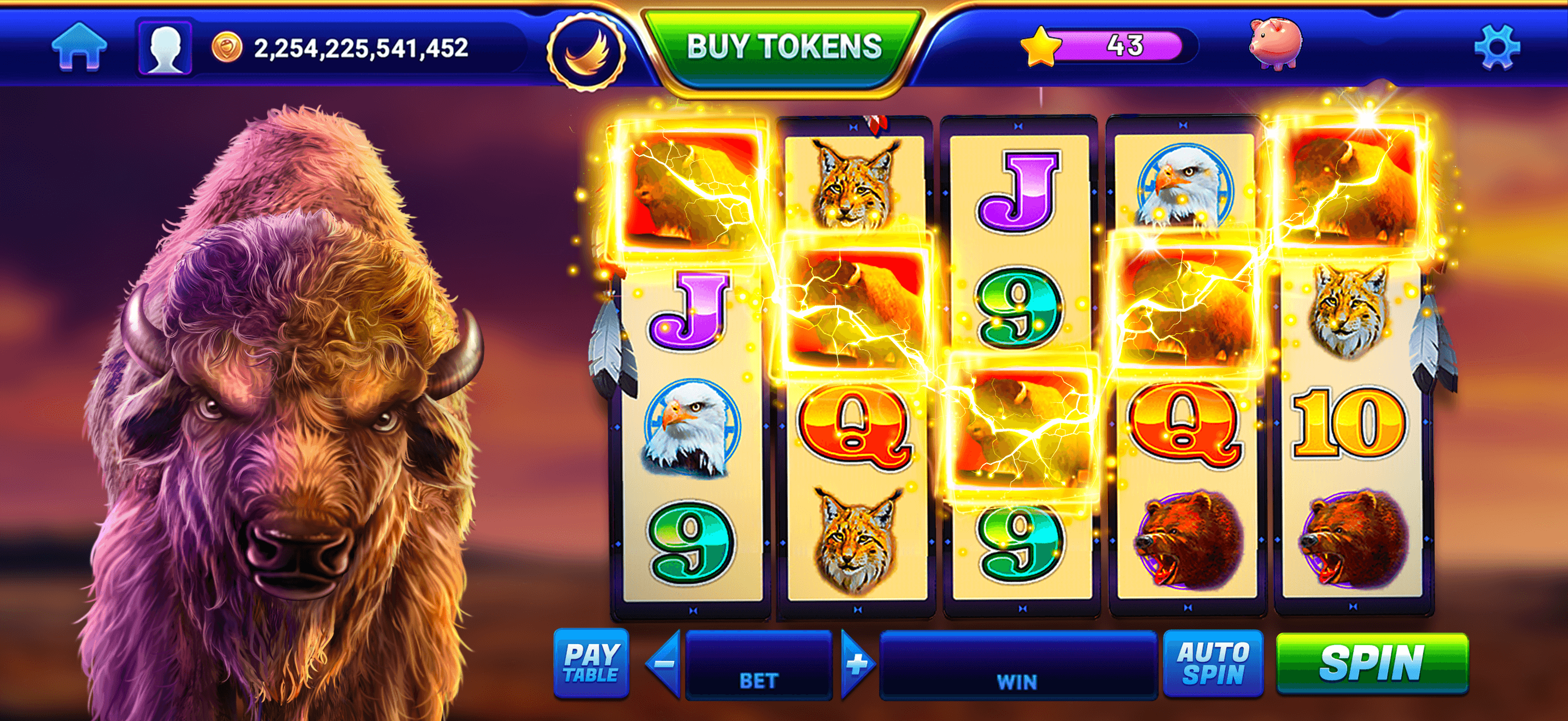 A buffalo-themed slot in GSN Casino with the token balance and Buy Tokens button along the top
